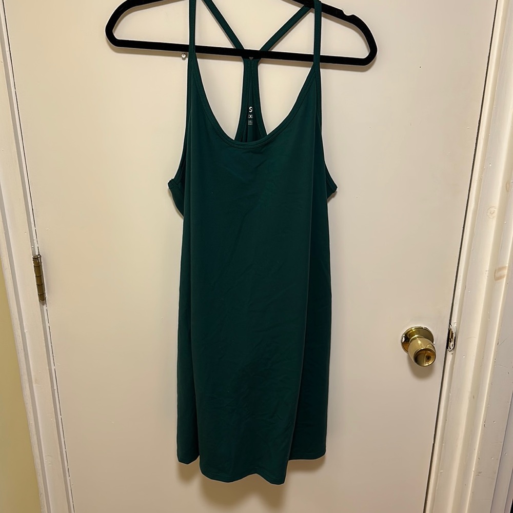 Never worn athletic dress with built in detachable mesh shorts